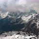 Air Flight Through Mountain Clouds Over Beautiful Snowcapped Peaks of Mountains and Glaciers - VideoHive Item for Sale