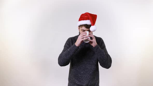 Man drinking from a mug alt