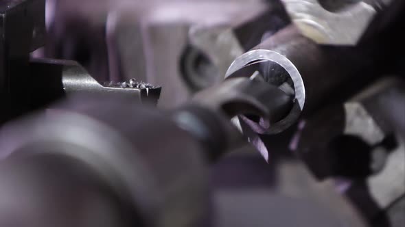 Metal lathe drilling into metal road and smoking alt