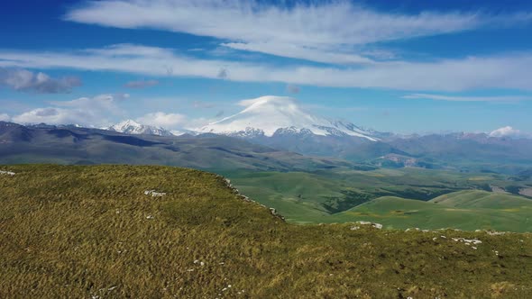 Mount Elbrus and Clouds Caucasus Mountains alt