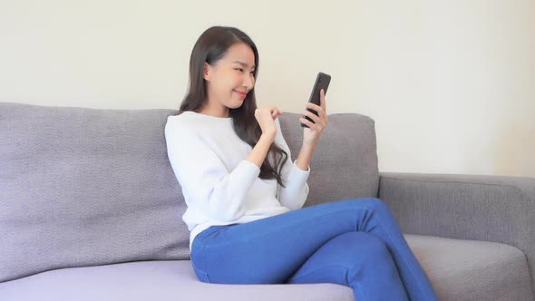 0108Young asian woman use smart phone