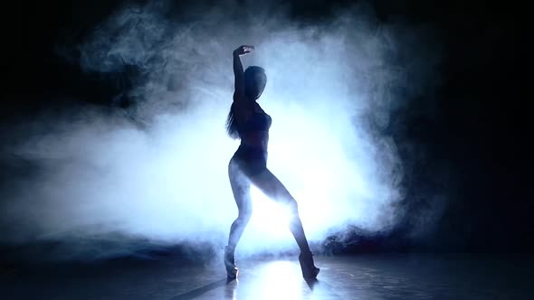 Sexy Tongue Out: Portrait of Beautiful Young Woman Posing. Slow Motion, Smoke alt