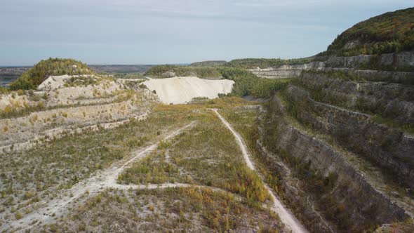 Aerial view of an old abandoned limestone quarry.