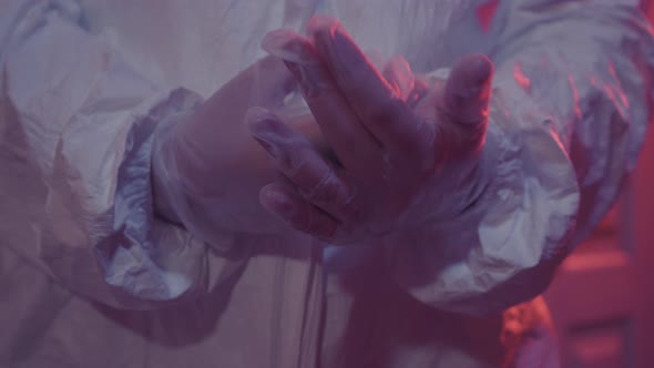 Unrecognizable Caucasian Doctor in Protective Gloves Applying Antiseptic Disinfectant alt