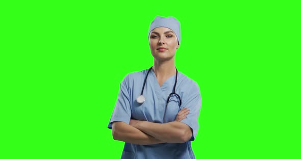 Caucasian female doctor on green screen background alt