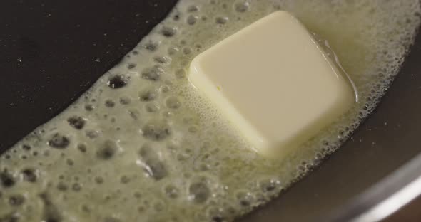 Melt A Piece Of Butter In A Frying Pan