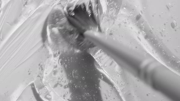 Gel Serum with Peptides Texture Spreading with Brush Footage alt