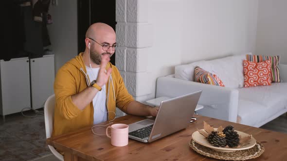 Young man doing video conference with remote connection.