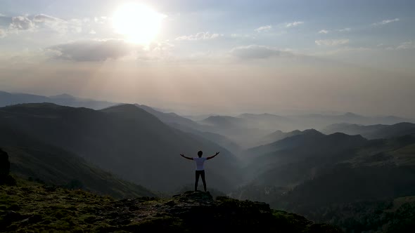 Man Watching Nature At Sunset alt