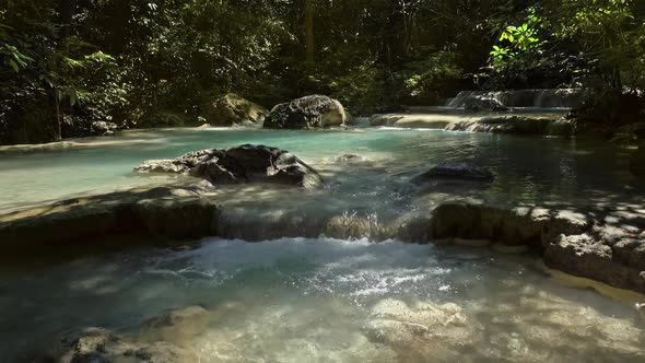 One of Waterfalls of Erawan Cascade in Thailand alt