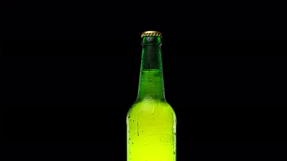Drops Trickle Down the Beer Bottle alt