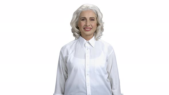 Portrait of Mature Business Woman on White Background alt