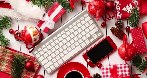 Christmas Presents and Decorations Around Gadgets and Beverage alt