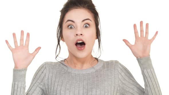 Exciting Happy Caucasian Young Brunette Girl Standing on White Background in Slowmotion and alt