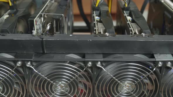 Close Up Of Cryptocurrency Mining Rig Working alt