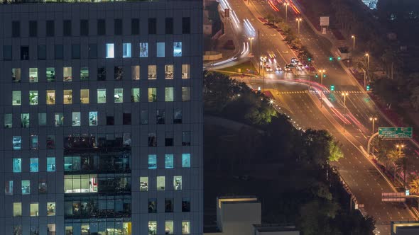 Skyline View of Intersection Traffic on Al Saada Street Near DIFC Night Timelapse in Dubai UAE alt