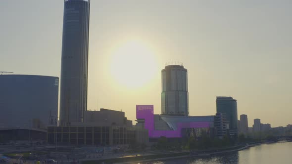 View From the Air at a Beautiful Pink Sunset Over the River in the City Centre