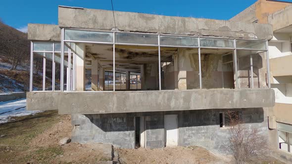 Abandoned, destroyed building after catastrophe. Industrial building after technological disaster co