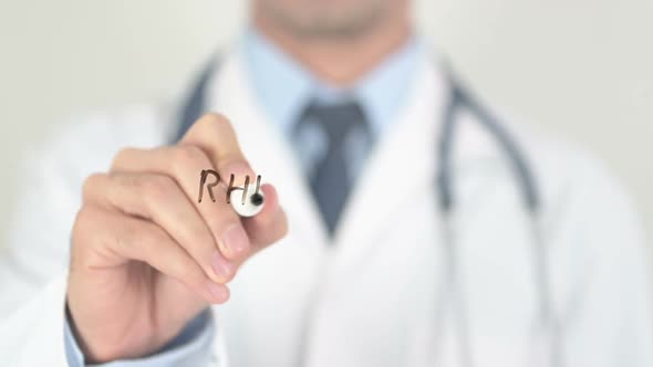 Rheumatoid Arthritis Doctor Writing on Transparent Glass alt