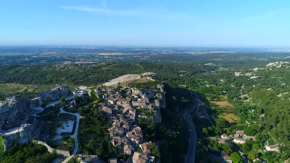 Village of Les Baux-de-Provence in Bouches-du-Rhone in France from the sky alt