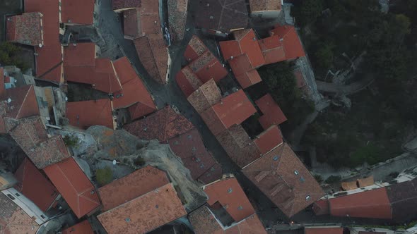 Flying over houses in Castelmezzano, Italy 4k