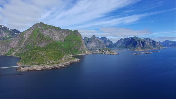 Scenic coast with town Reine on Lofoten islands in Norway alt