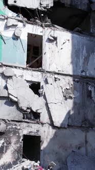 Vertical Video of a Destroyed Residential Building in Ukraine During the War alt