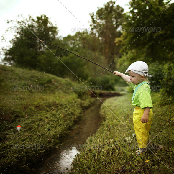 photo of little boy fishing Stock Photo by ababaka