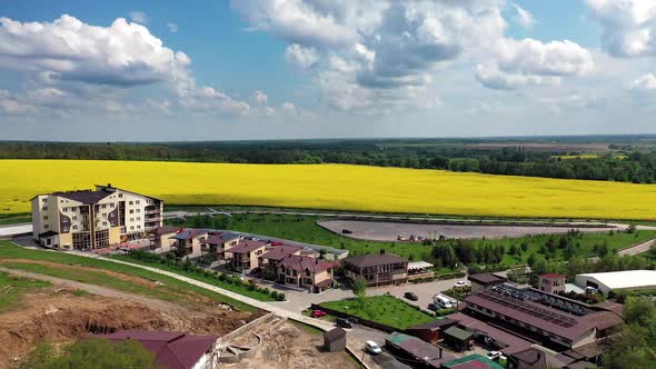 Residential area in suburb of city. Aerial view of apartment complex in the countryside alt