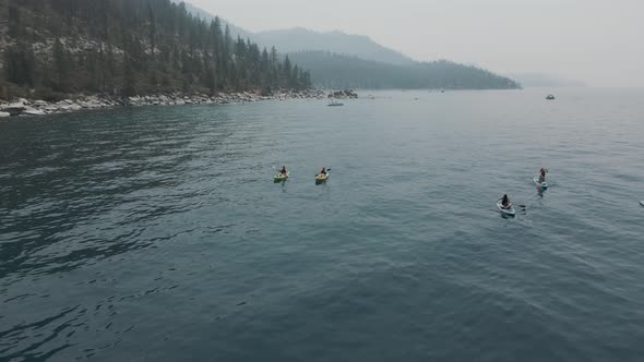 Paddle board adventures on the lake. Summer water sport activities