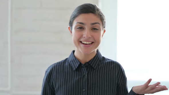 Beautiful Young Indian Woman Doing Video Chat alt