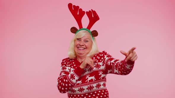 Crazy Senior Elderly Grandmother Woman Demonstrating Tongue Out Fooling Around Making Silly Faces alt