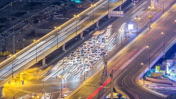 Night Traffic on a Busy Intersection at Dubai Downtown Highway Aerial Timelapse alt