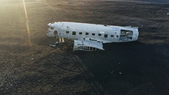 Drone Over Plane Wreck At Sunset alt