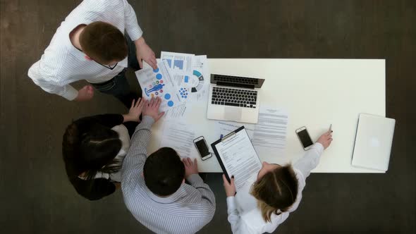 Young Business Team Discussing Together New Project Strategy alt