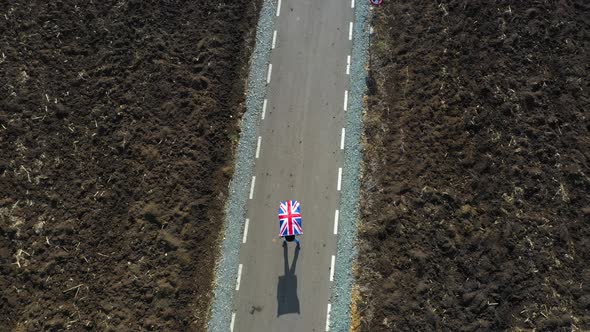 Man with UK flag - drone view