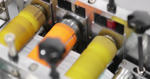 Automated Machinery Stitch Medical Mask Without Elastic Bands At Production Line. - High Angle Shot, alt