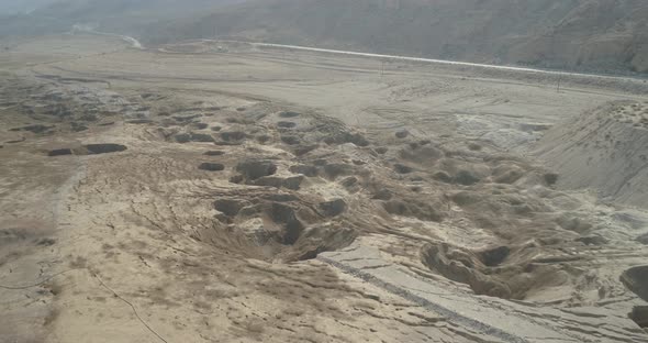 Aerial view of colourful sinkholes at dead sea, Negev, Israel. alt