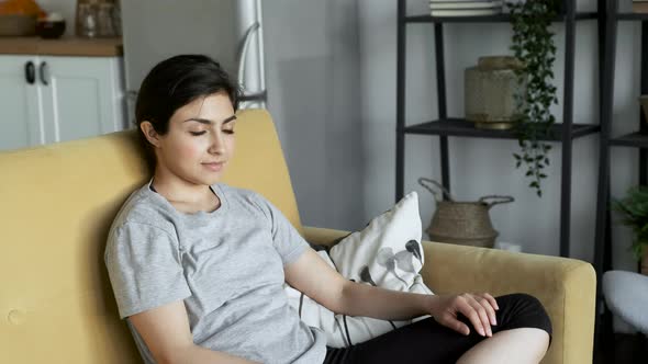 A Young Woman Thinks about Good Thoughts, Does Meditation and Imagines, Breathes Evenly alt