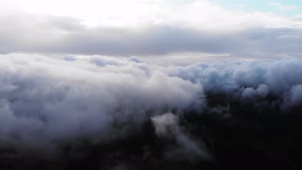 Amazing Aerial Shot Drone Flying Over Fluffy Blue and White Clouds