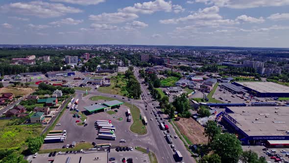 Crossroads and Many Vehicles Driving the Road alt