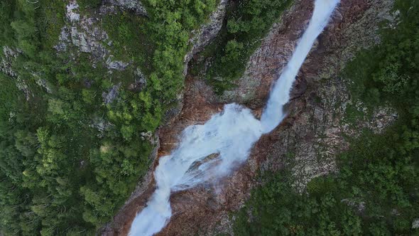Taimazi Waterfalls Flowing Down From the Slope of Taimazi Mountain alt
