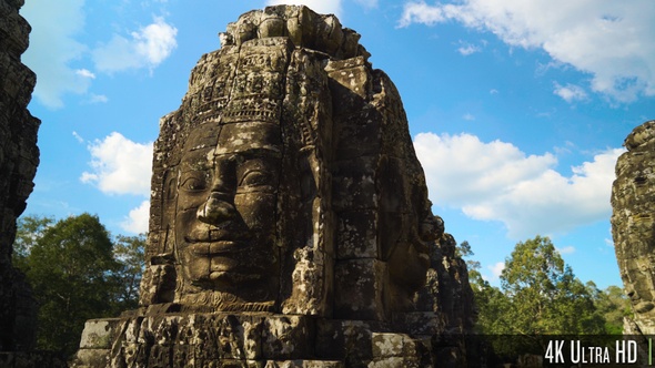4K Ancient Stone Faces of Bayon Temple inside of Angkor Thom in Siem Reap, Cambodia alt