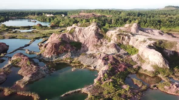 Aerial view blue lake surrounding Bukit Katak, Guar Petai alt