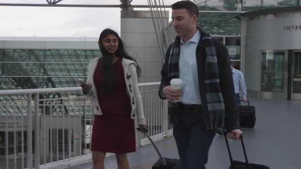 Business people walking at airport