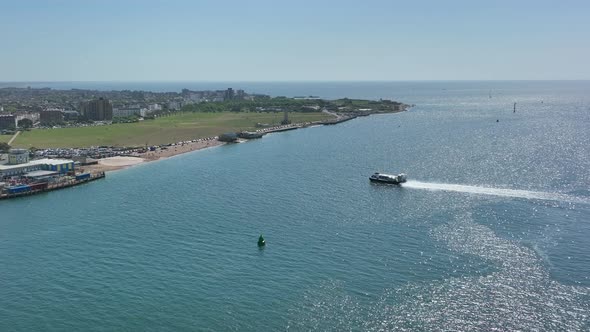 Hovercraft Arriving into a Hoverport in the Summer Aerial View alt