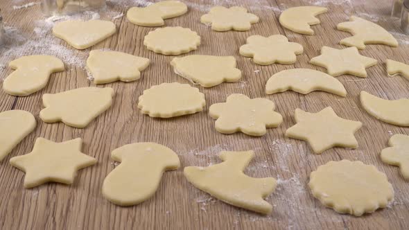 The process of making cookies from shortbread dough. alt