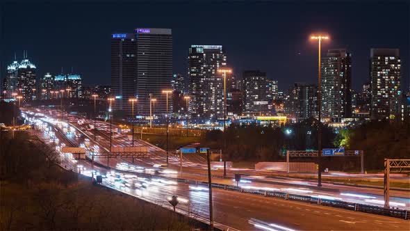 Toronto, Canada, Timelapse  - Close up of the Ontario 401 Highway at Night as seen from a bridge