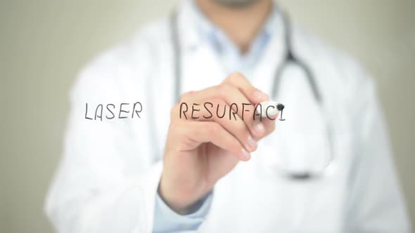 Laser Resurfacing, Doctor Writing on Transparent Screen alt