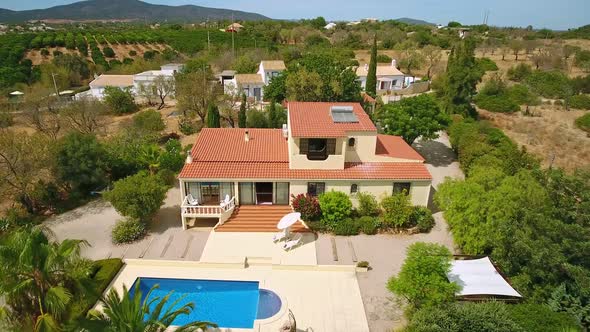 Aerial Video of Private Luxury Villa a Delightful Pool and Some Nice Green Vegetation